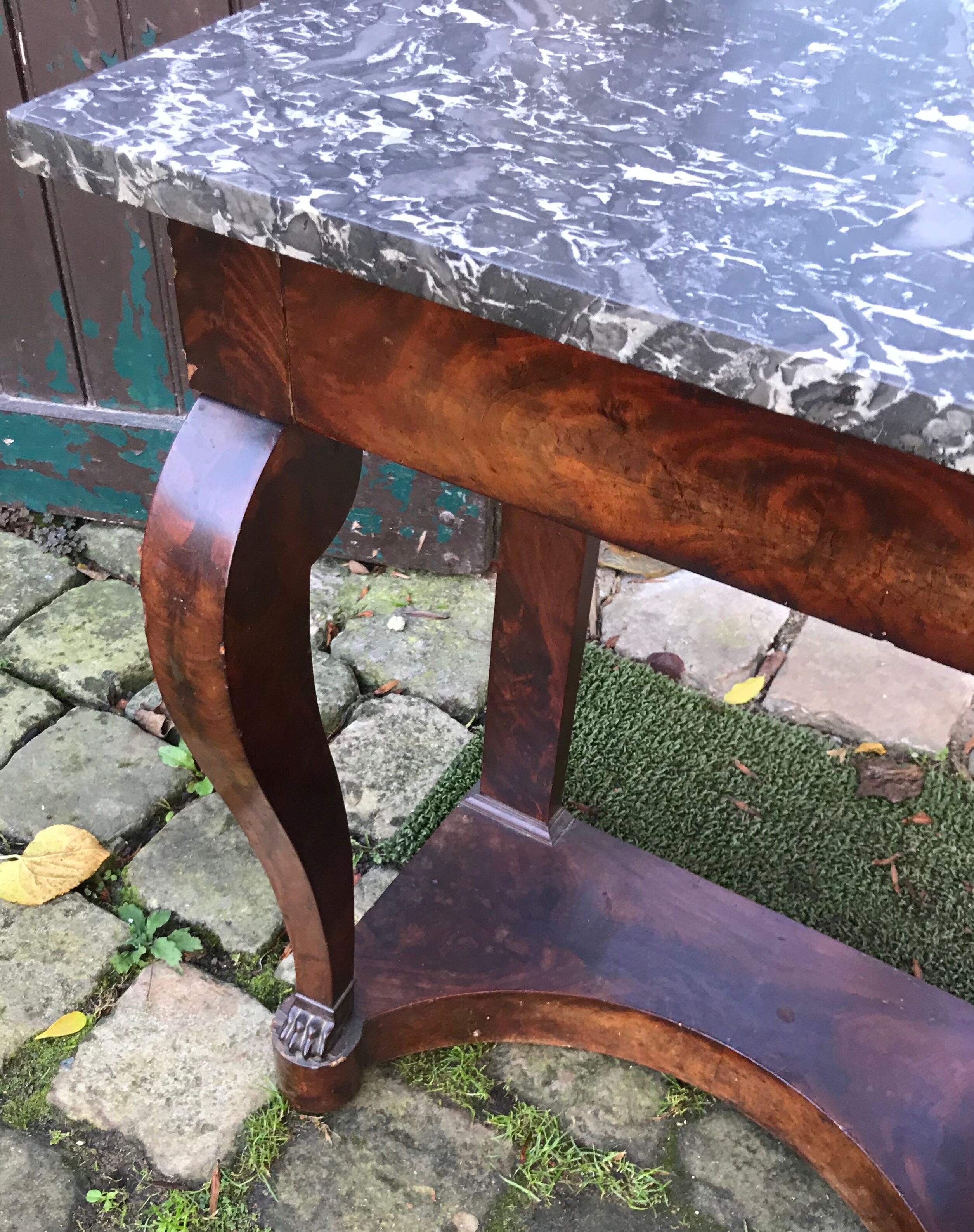 Empire-style console with marble and mahogany claws