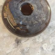 Flattened spherical vase made of glass paste