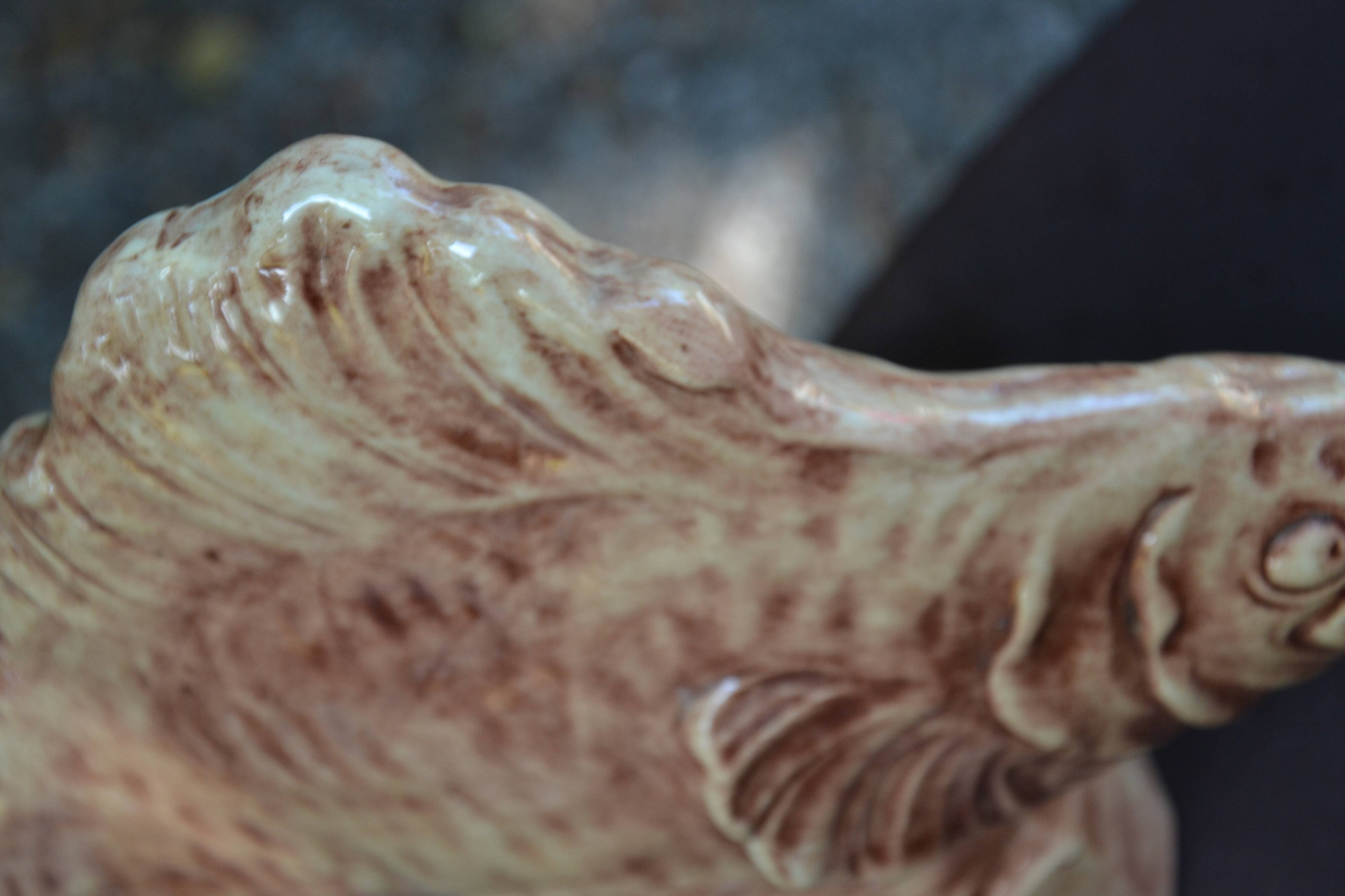 Ceramic fish statuette signed