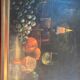 Tableau nature morte fruits raisin et oranges
