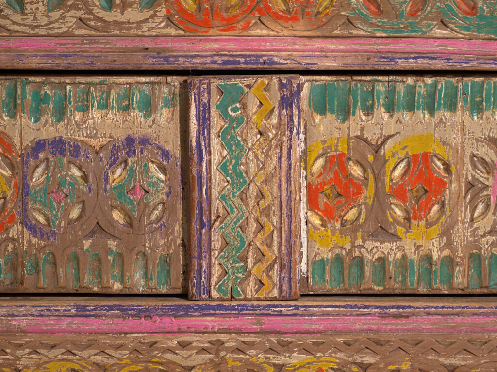 Antique carved low cabinet with drawers in pine – Xinjiang, circa 1900