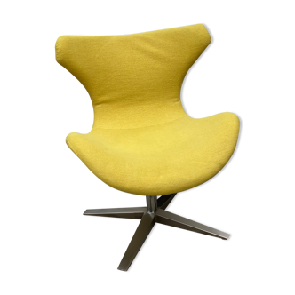 Vintage yellow swivel lounge chair