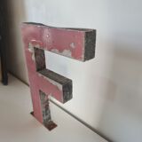 Letter F in vintage iron