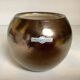 Small round vase, cracked golden ceramic.