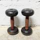 Pair of vintage cast iron and wood dumbbells