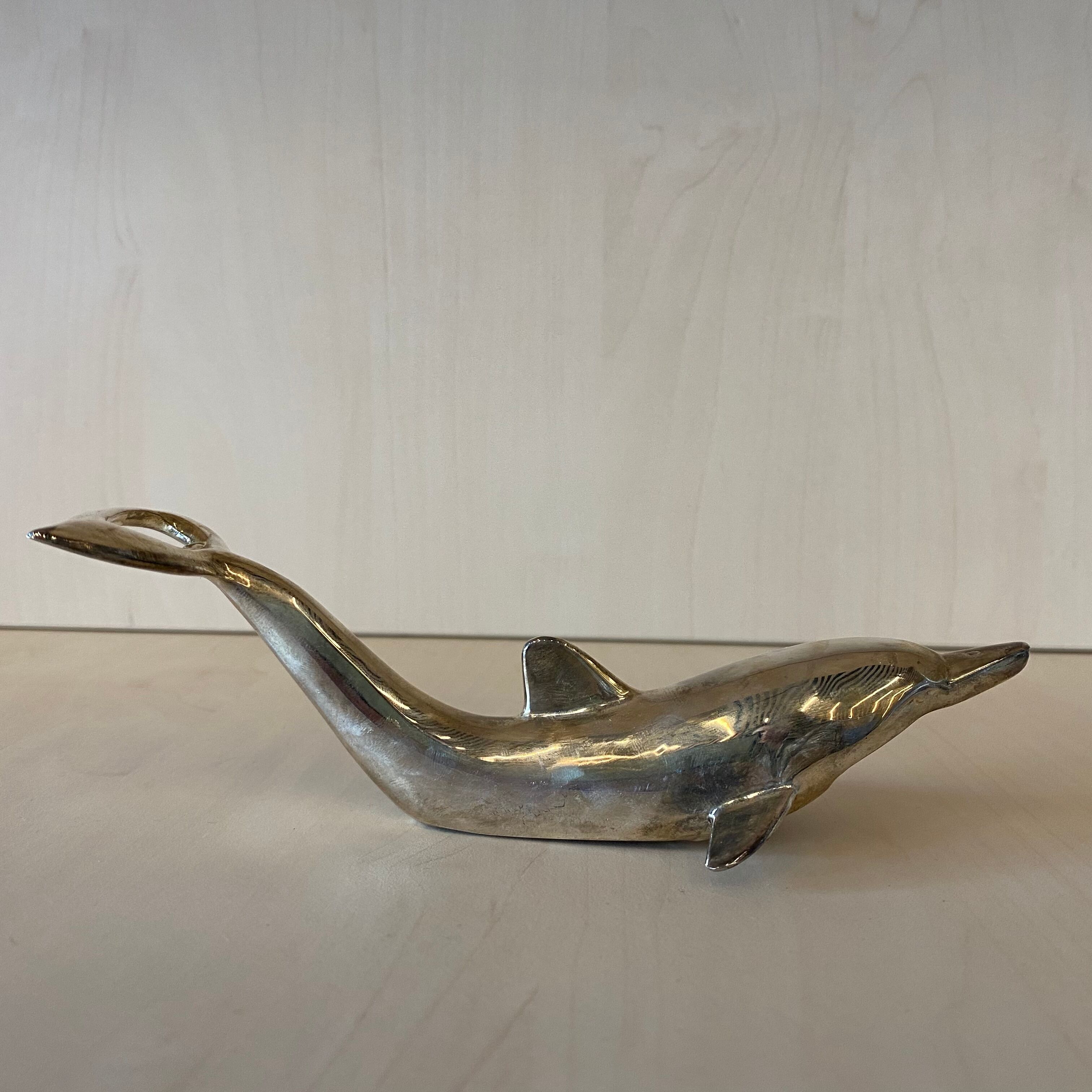 Vintage bottle opener dolphin