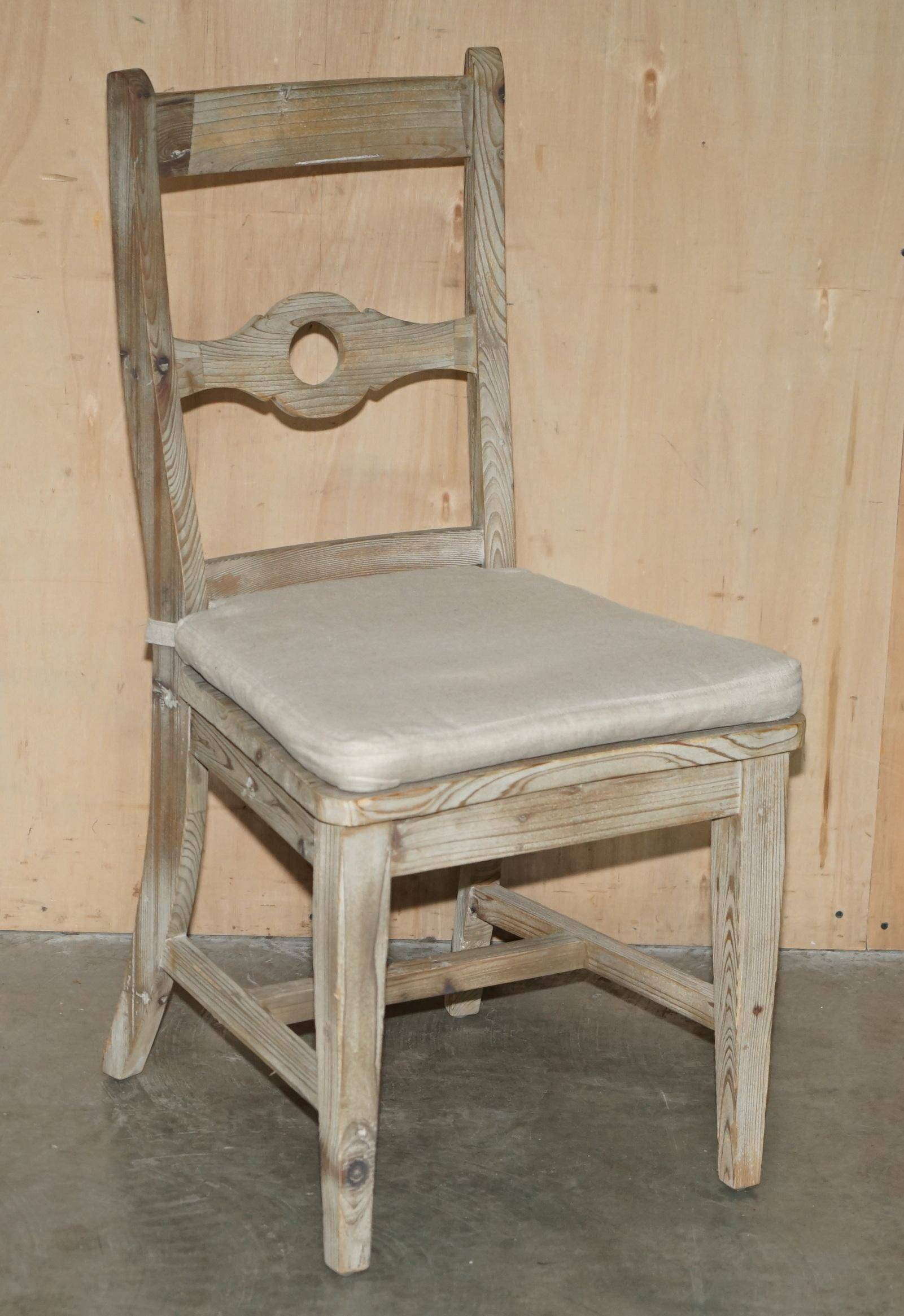 Pair of Swedish-style accent chairs in recycled pine with upholstered seats.