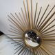 Golden metal witch's eye sun mirror from the 70s, 86cm.