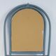 Sage green painted rattan mirror