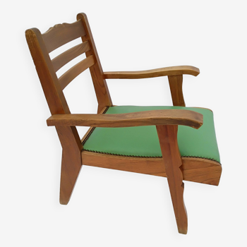 Fauteuil bois et skaî années 50