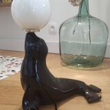 Vintage black sea lion lamp