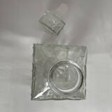 Molded glass carafe, 1960s-1970s, stylized flower decoration, oval, square base, stopper, rosette