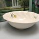 Round dish model embrun, with yellow floral patterns. stamped salins france