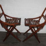 2 wooden folding chairs