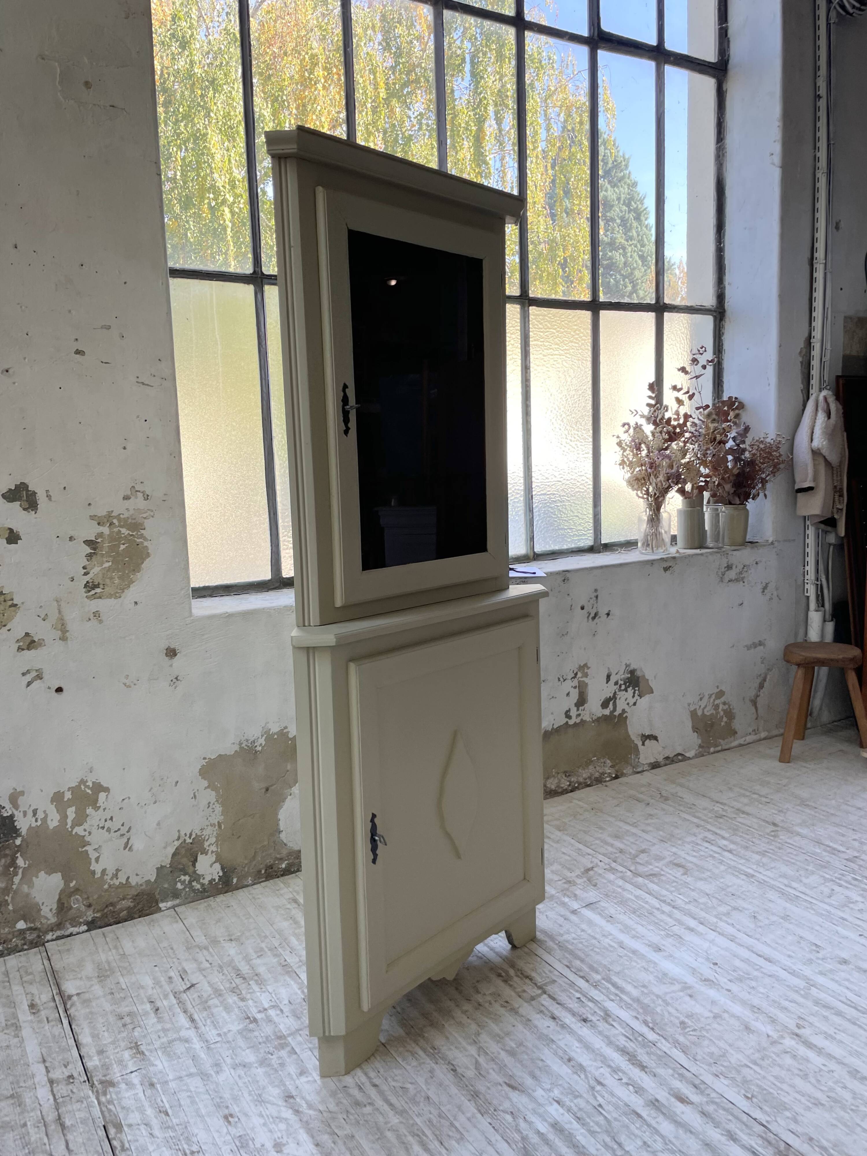 Corner display cabinet from the 1950s