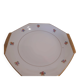 Hexagonal plate Lamotte with a double gold border, decorated with small bouquets.