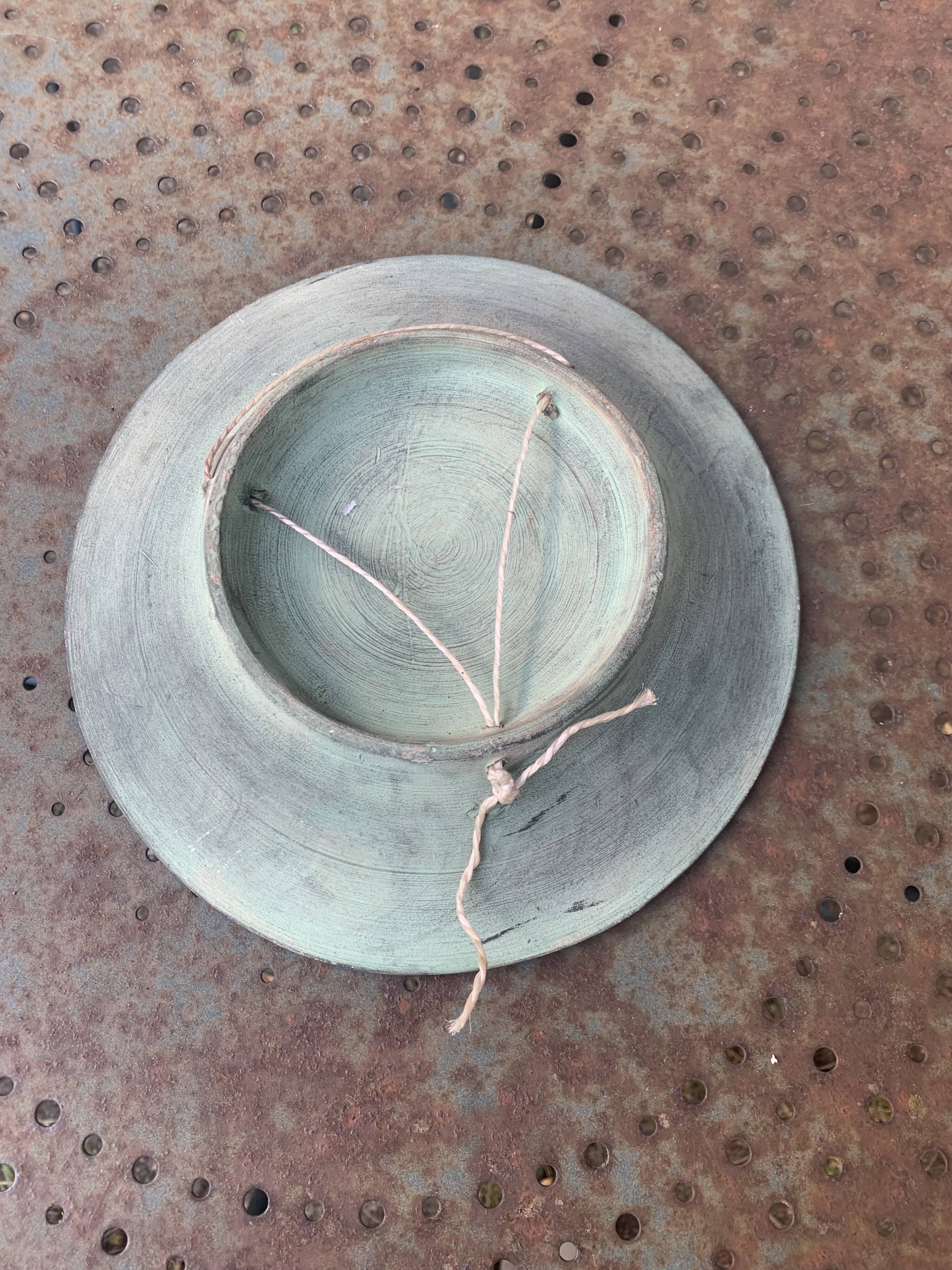 Decorative plate of a Greco-Roman soldier, terracotta, vintage