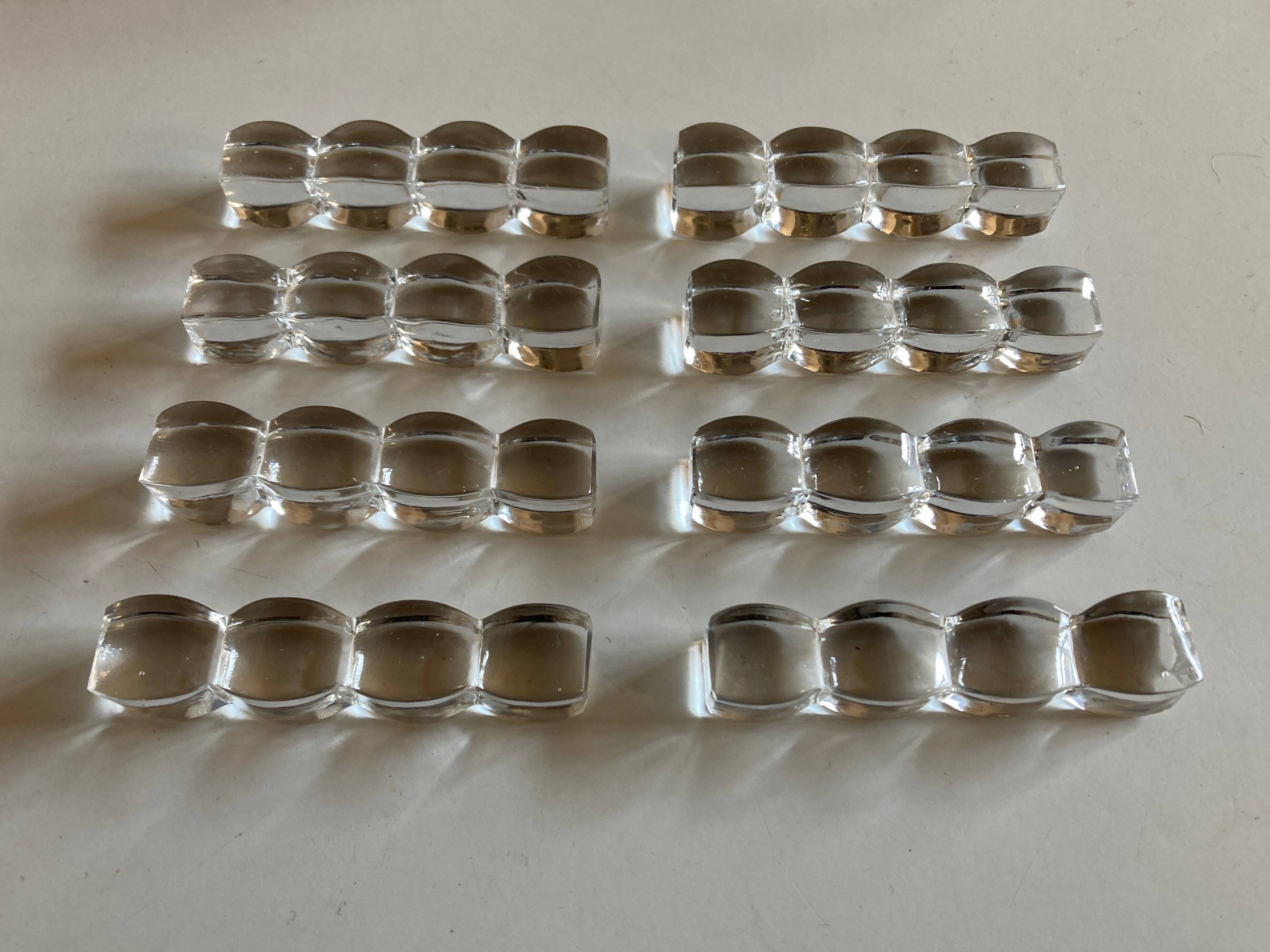Set of 8 modernist crystal cushion knife holders ringing 1940