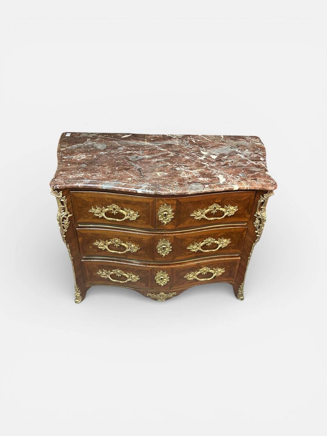Louis XV period commode with violet wood veneer.