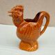 Rooster pitcher