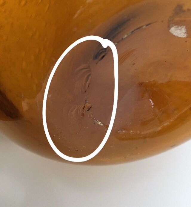 Biot blown glass amber bottle