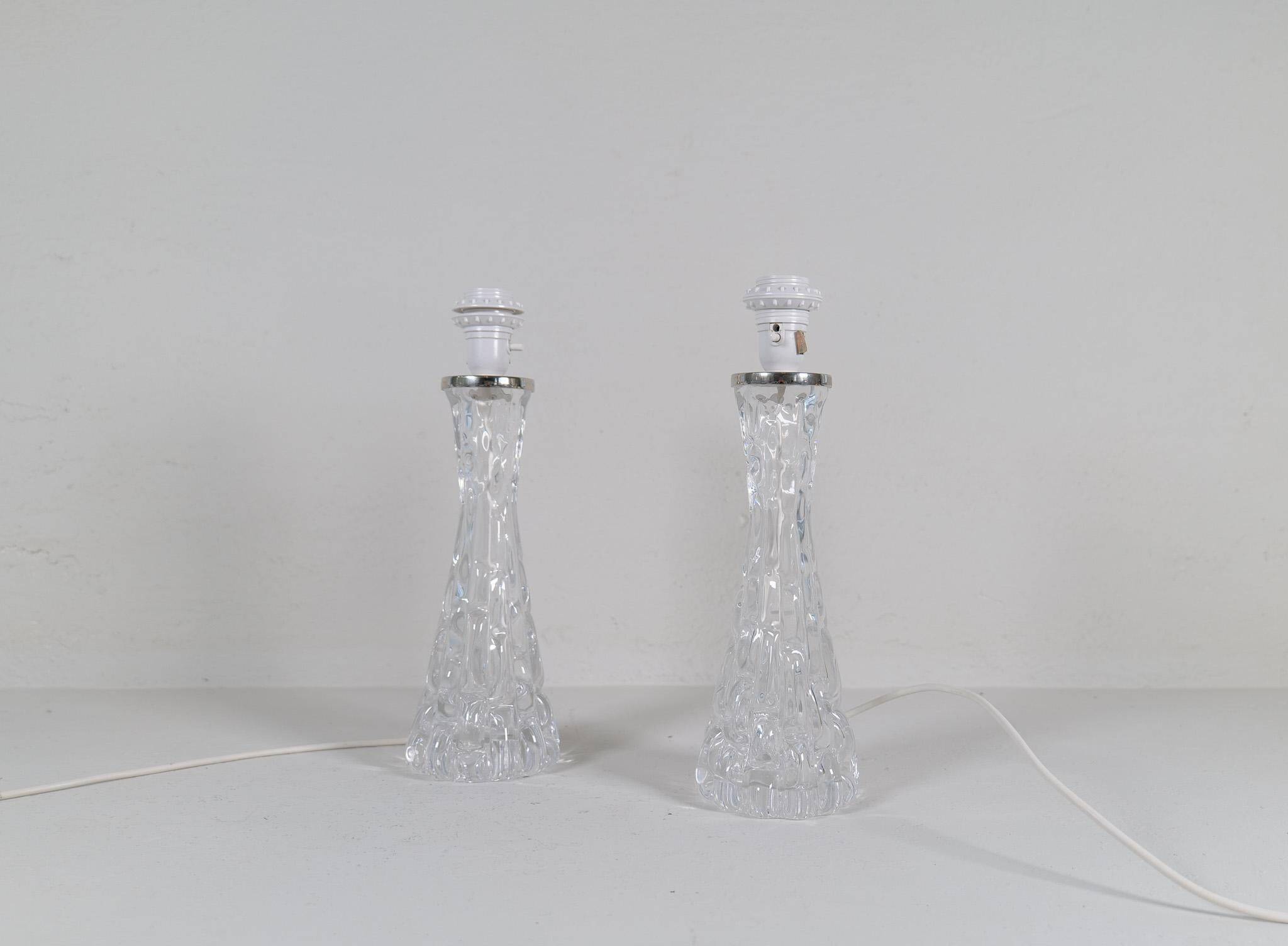 Mid-century modern crystal table lamps by Orrefors, designed by Carl Fagerlund, Sweden, 1970s.