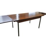 Vintage wooden dining table with chrome frame.