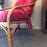 Duo of rattan armchairs with cushions