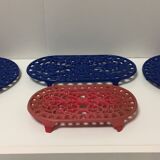 Set of four enameled cast iron trivets retro design vintage art