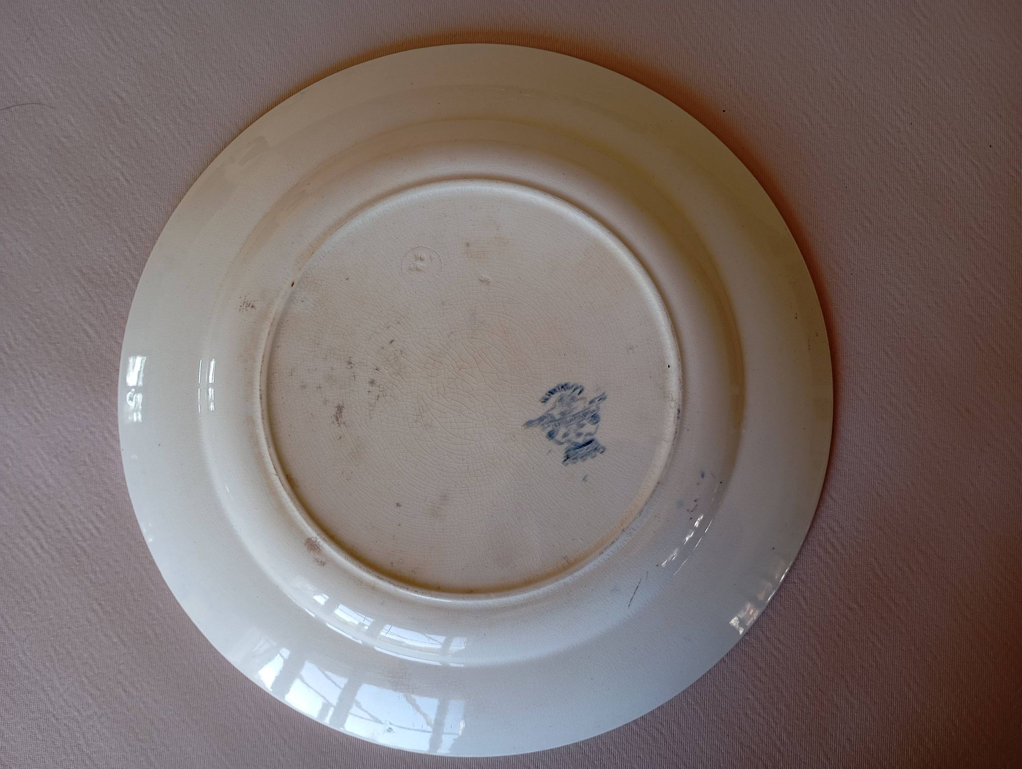 Plat à gâteau en terre de fer Longwy "Marguerites"