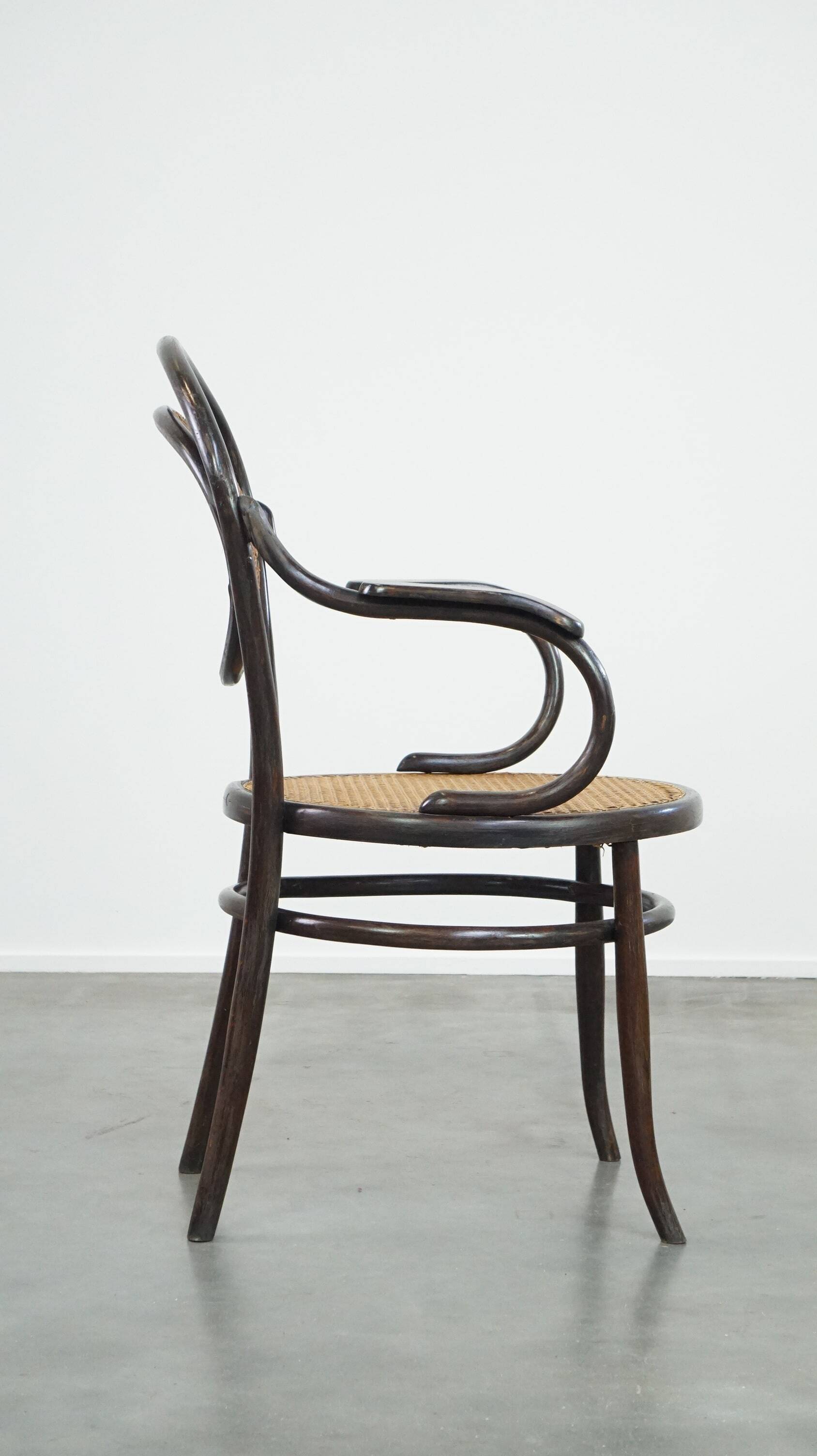 Very charming, elegant, vintage bentwood design bistro chair with comfortable armrests