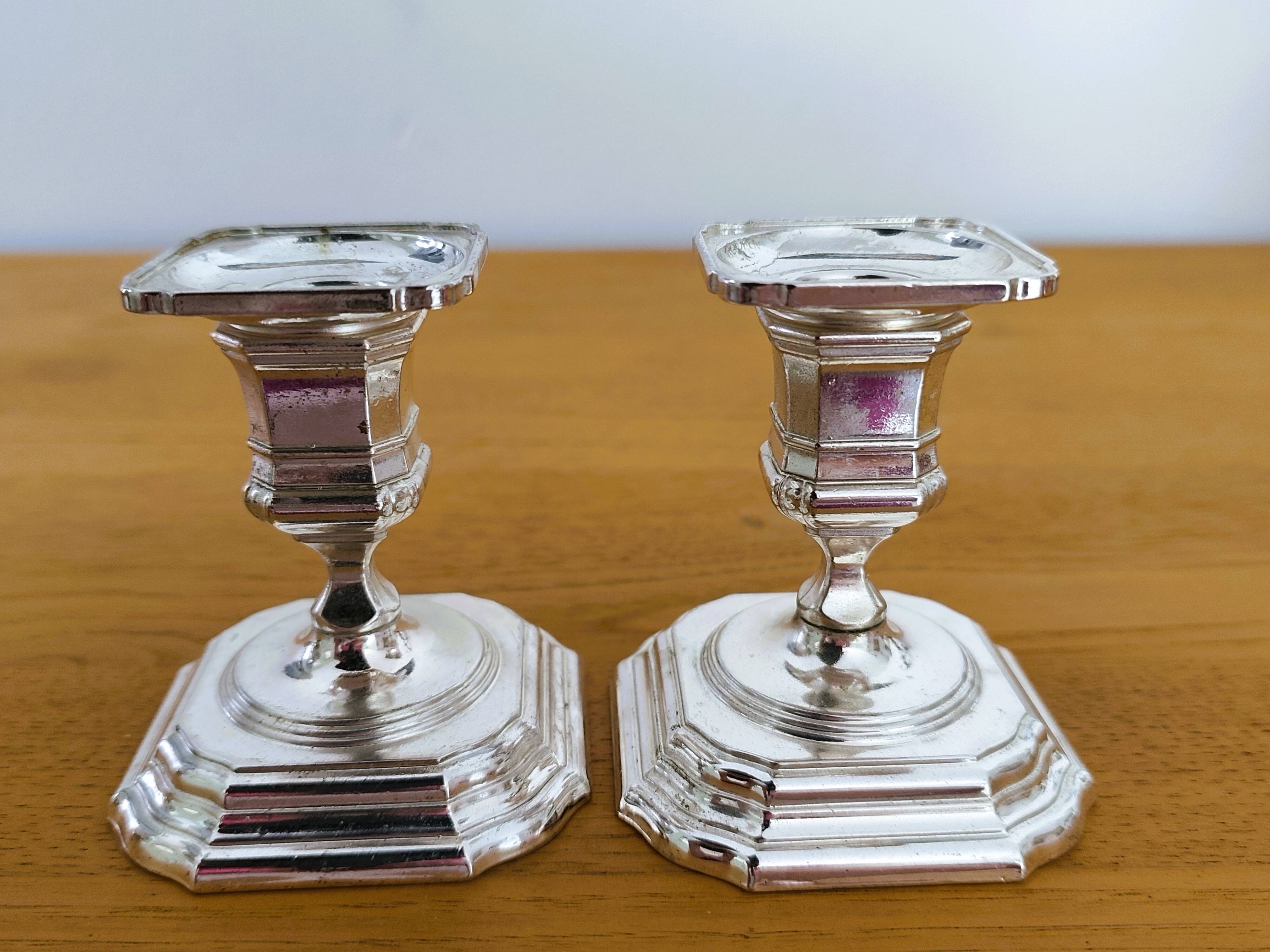 Pair of antique silver-plated candlesticks