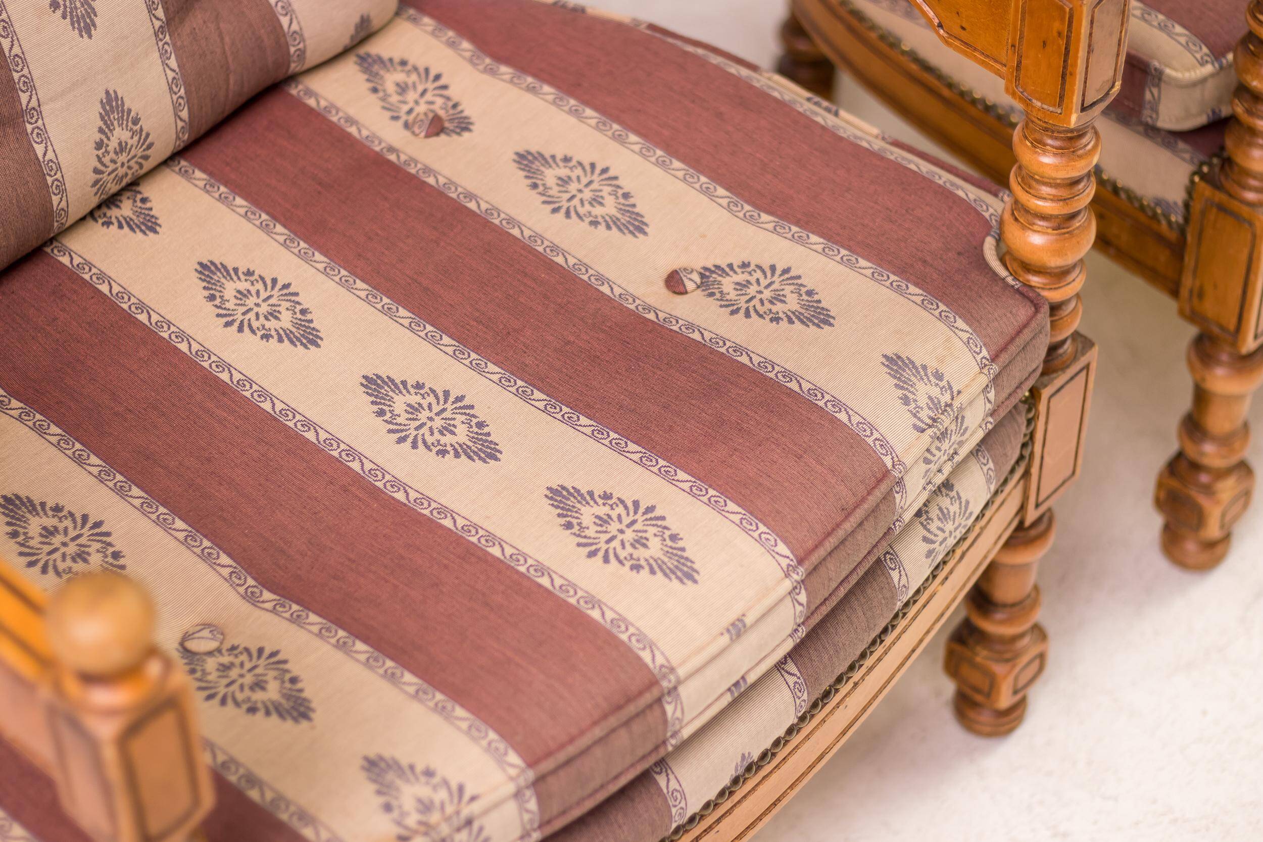 Pair of Giorgetti "1975 Gallery" armchairs in carved wood, original upholstery.
