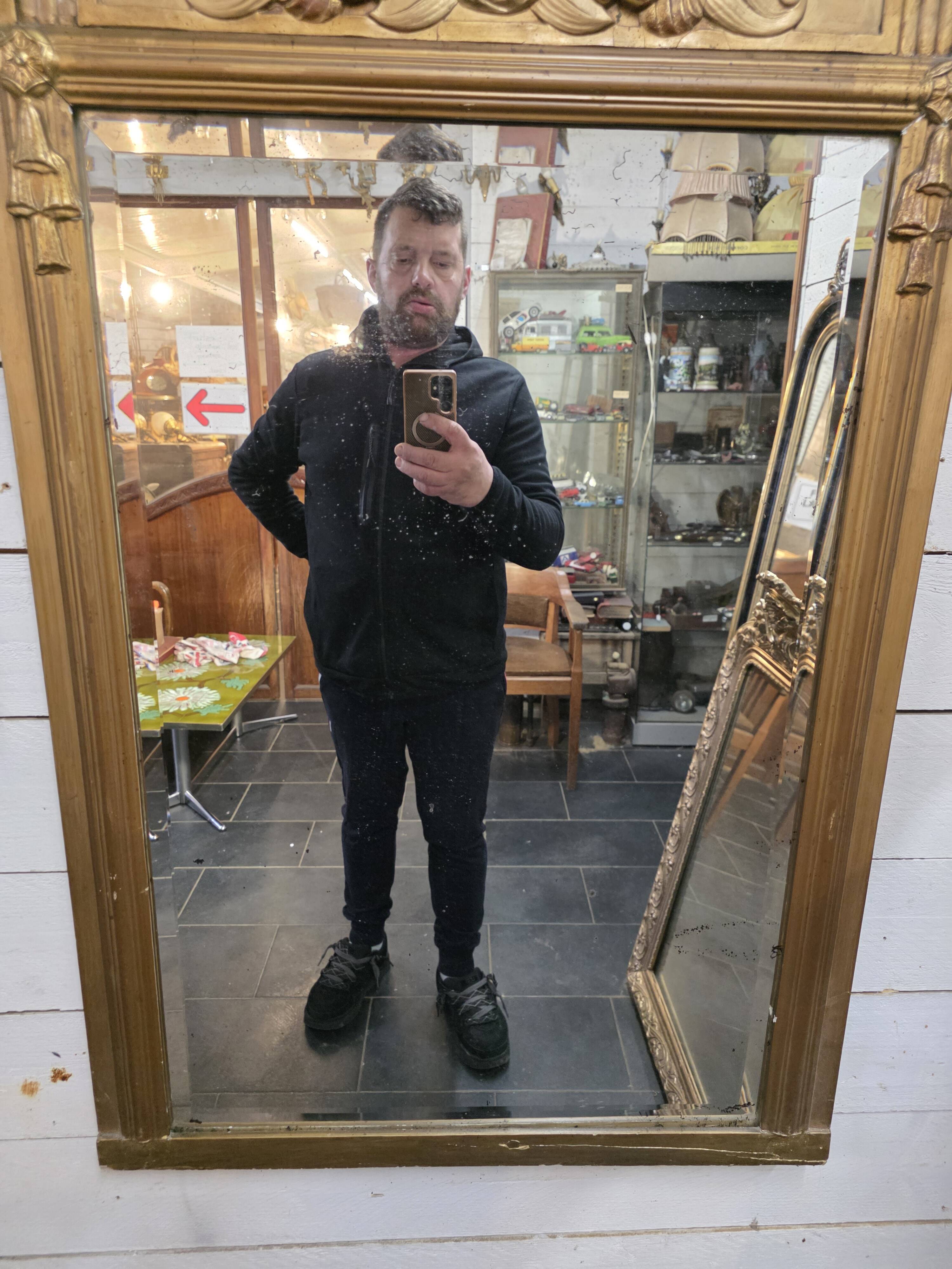 Art Deco gilded trumeau, bevelled mirror