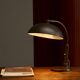Modernist desk lamp in patinated brass from the 1930s.