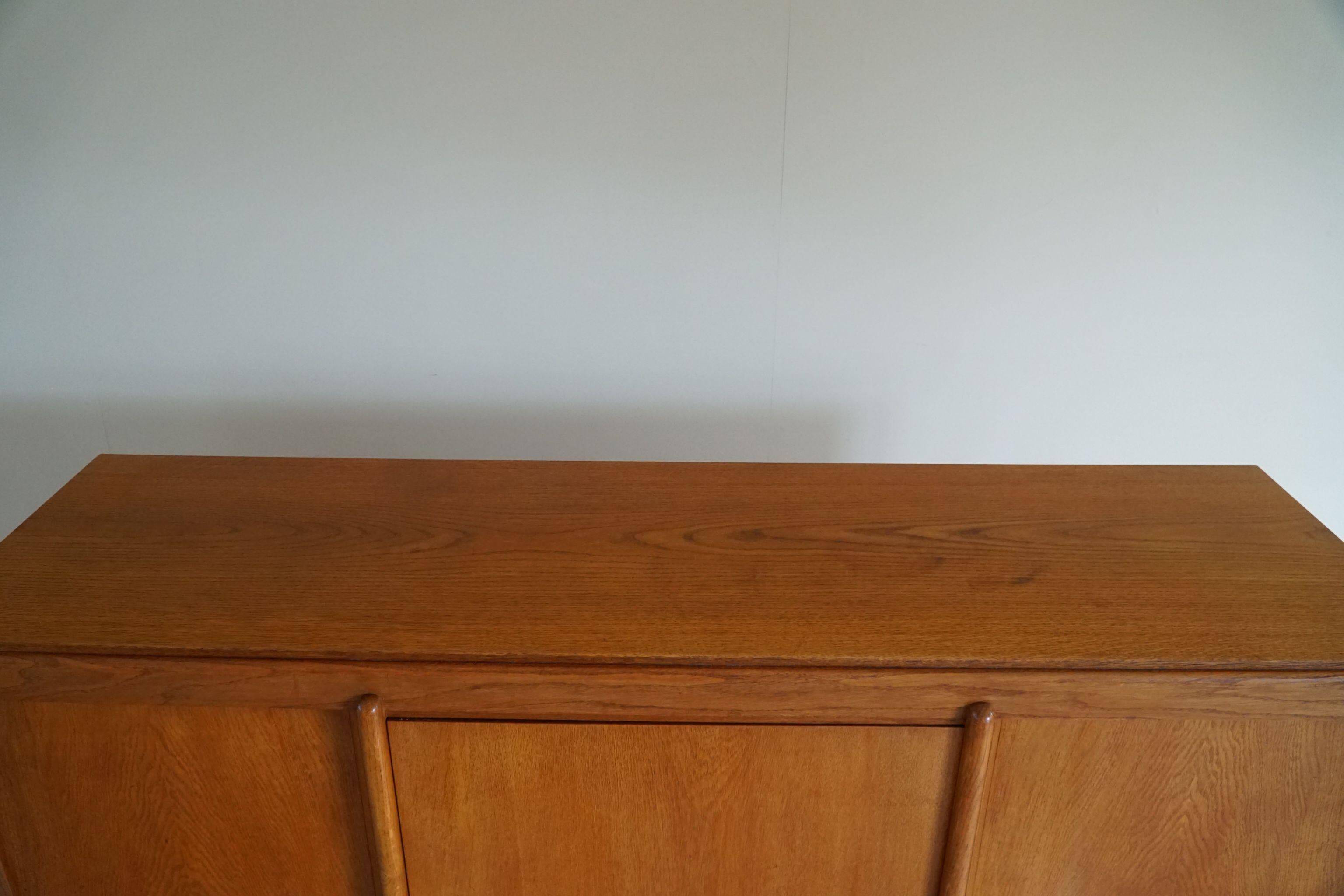 Mid-century buffet/enfilade in teak and oak, Danish cabinetmaker, 1960s