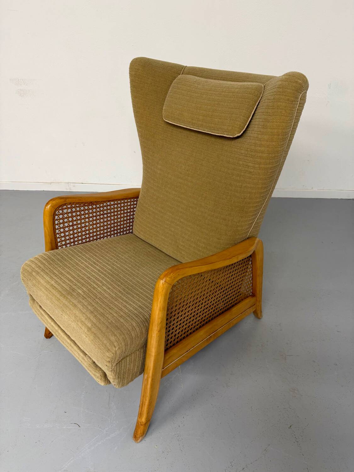 Vintage wingback recliner in Scandinavian design from the 1960s.