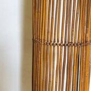 Mid-century rattan floor lamp, in the style of Louis Sognot.