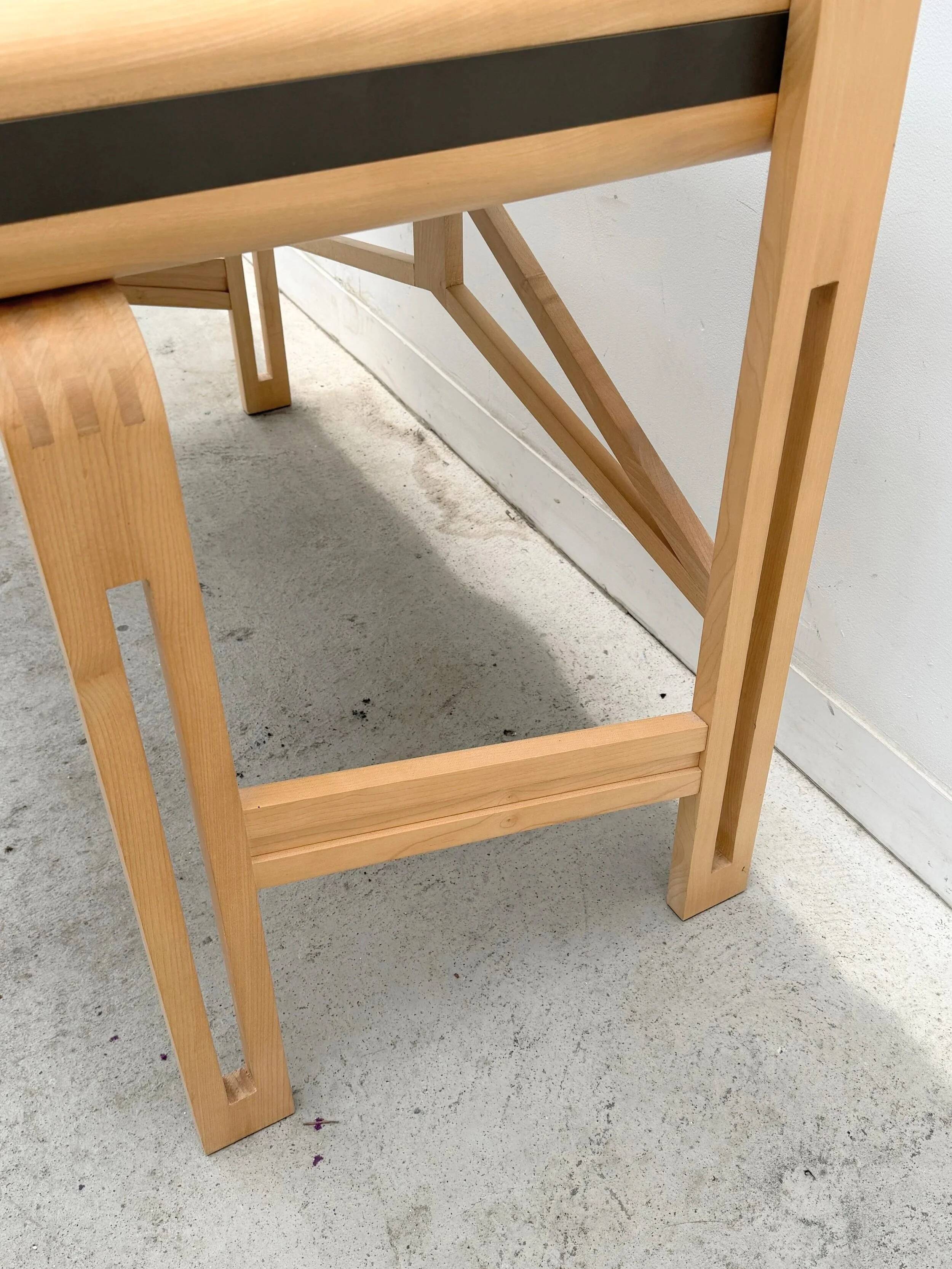 Solid wood and formica desk made by a cabinetmaker.