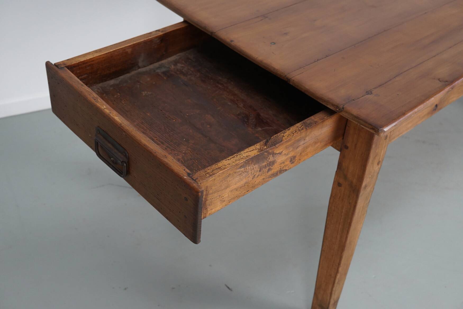 Rustic dining table in fruitwood from the early 20th century