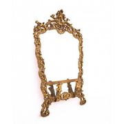 A large mirror in a gold frame, Italy, first half of the 20th century.