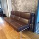 Trio of vinco armchairs in imitation leather