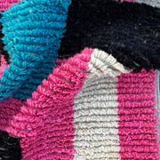 Moroccan Berber rug corridor in pink and blue wool.
