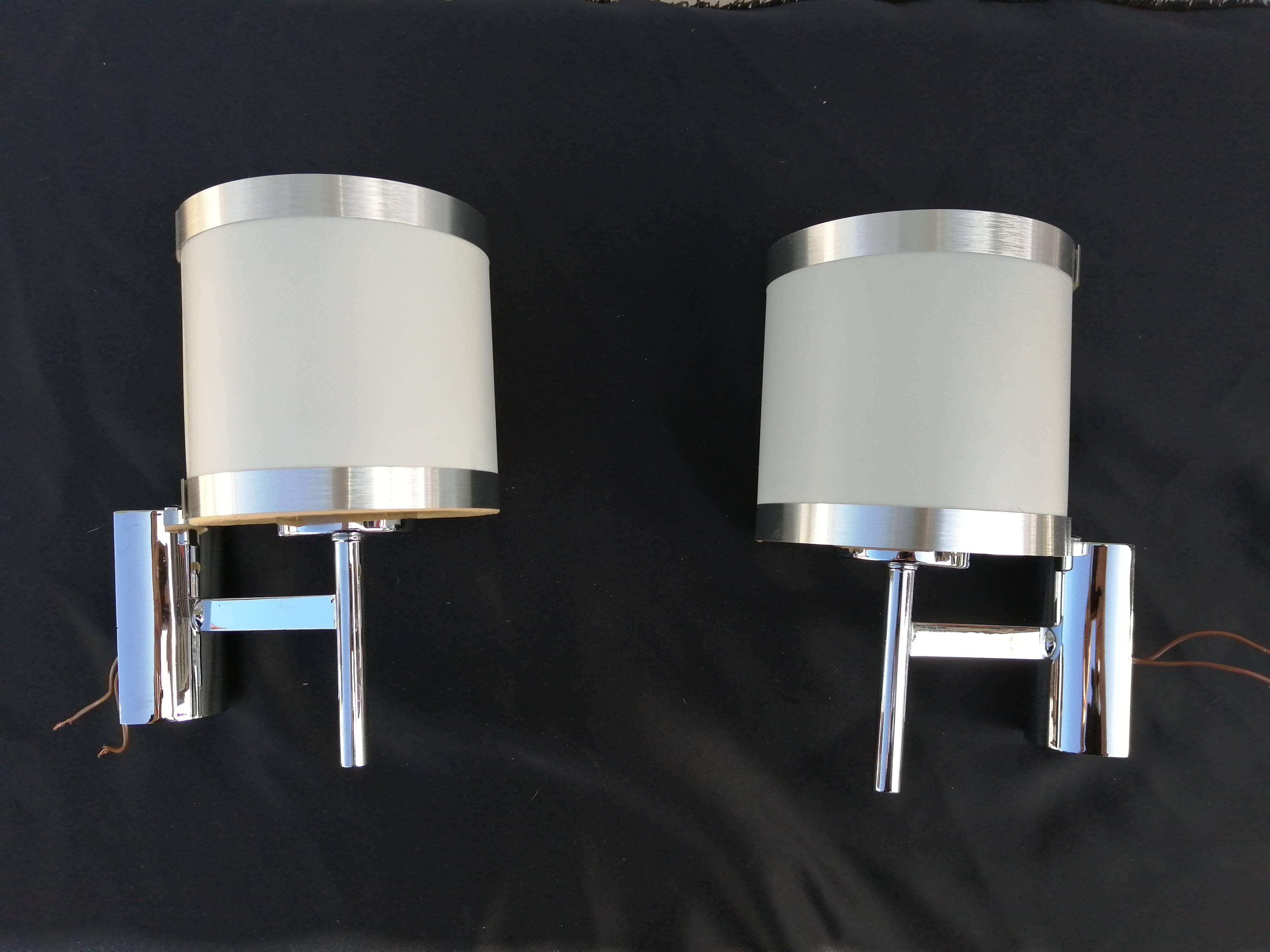 Pair of chrome design wall lights and vintage white hat 1970