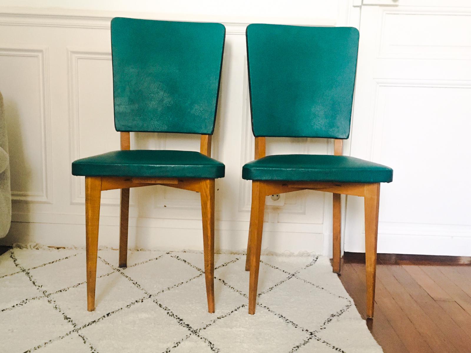 Two 1950s chairs made of wood and skai