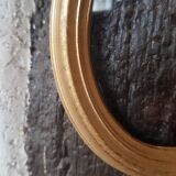 Small oval golden frame