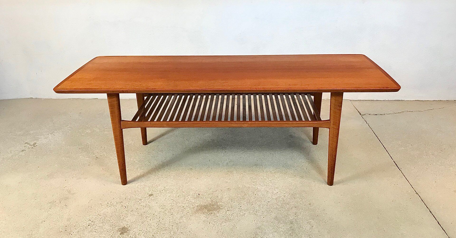 Scandinavian teak coffee table with slatted shelf, Denmark 1960s