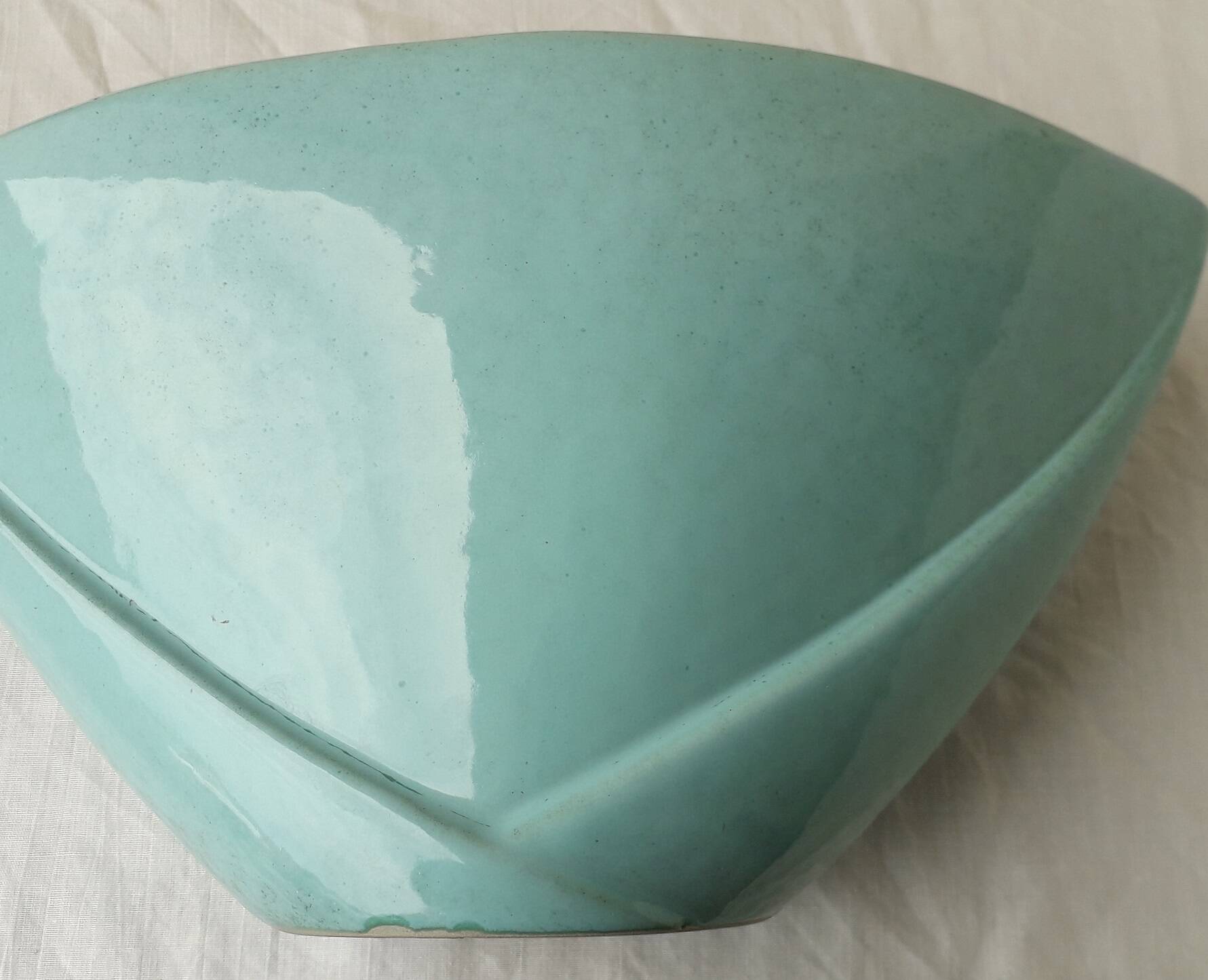 Triangular ceramic vase