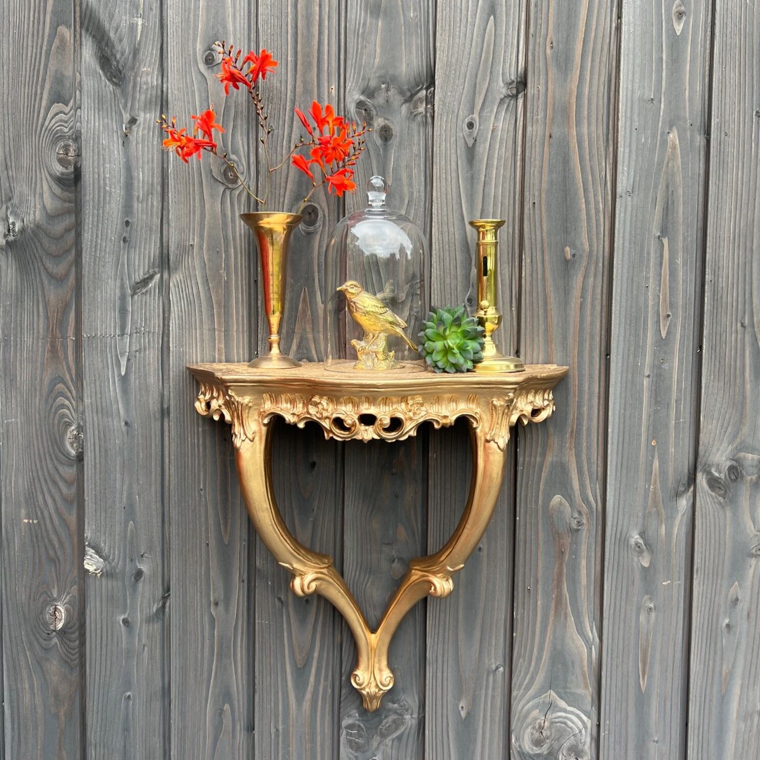 Golden wall console, baroque style