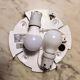 Oval wall lamp Artemide Italy design Patrick Jouin orange and white.